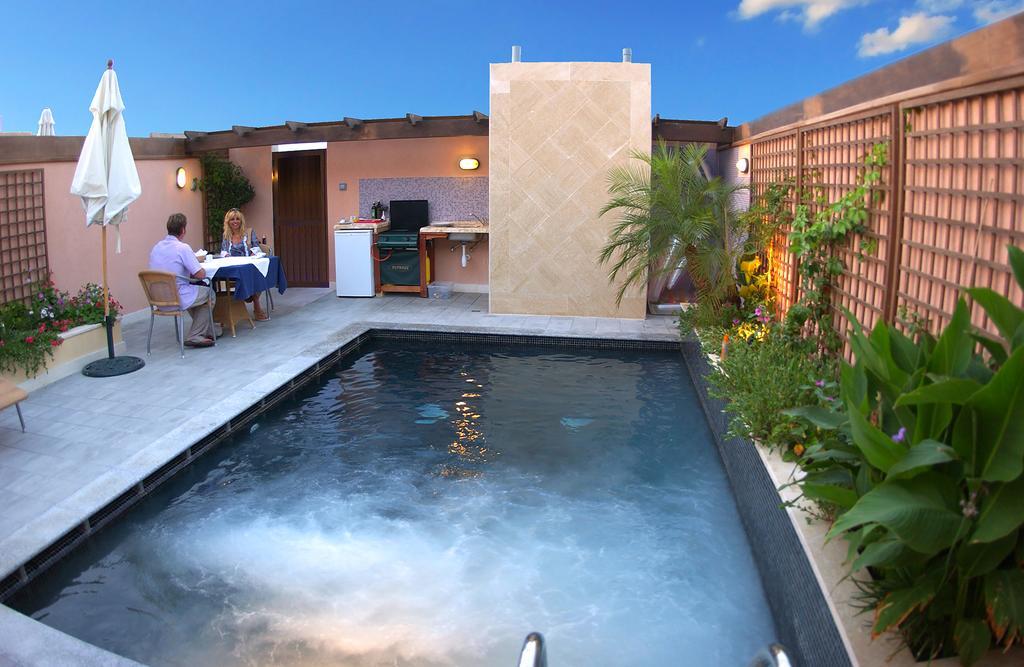 Fortina Spa Resort Sliema Bagian luar foto A rooftop pool in Marrakech, Morocco