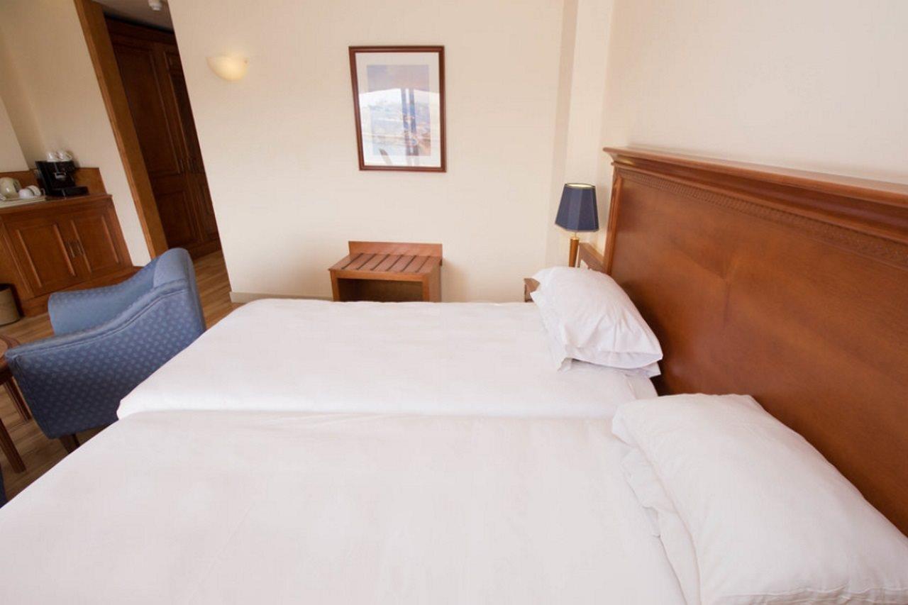 Fortina Spa Resort Sliema Bagian luar foto A bedroom at the hotel